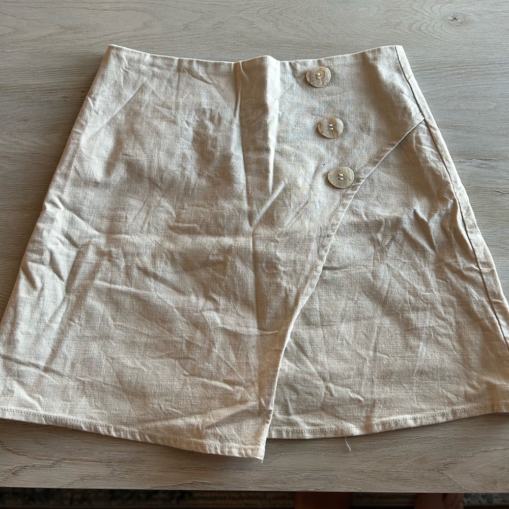Tan Forever 21 Mini Skirt with zip up back and button detail in Size Small